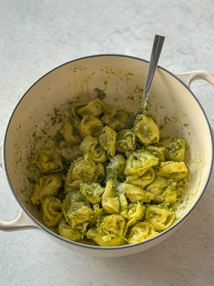 tortelinni in the pot with pesto