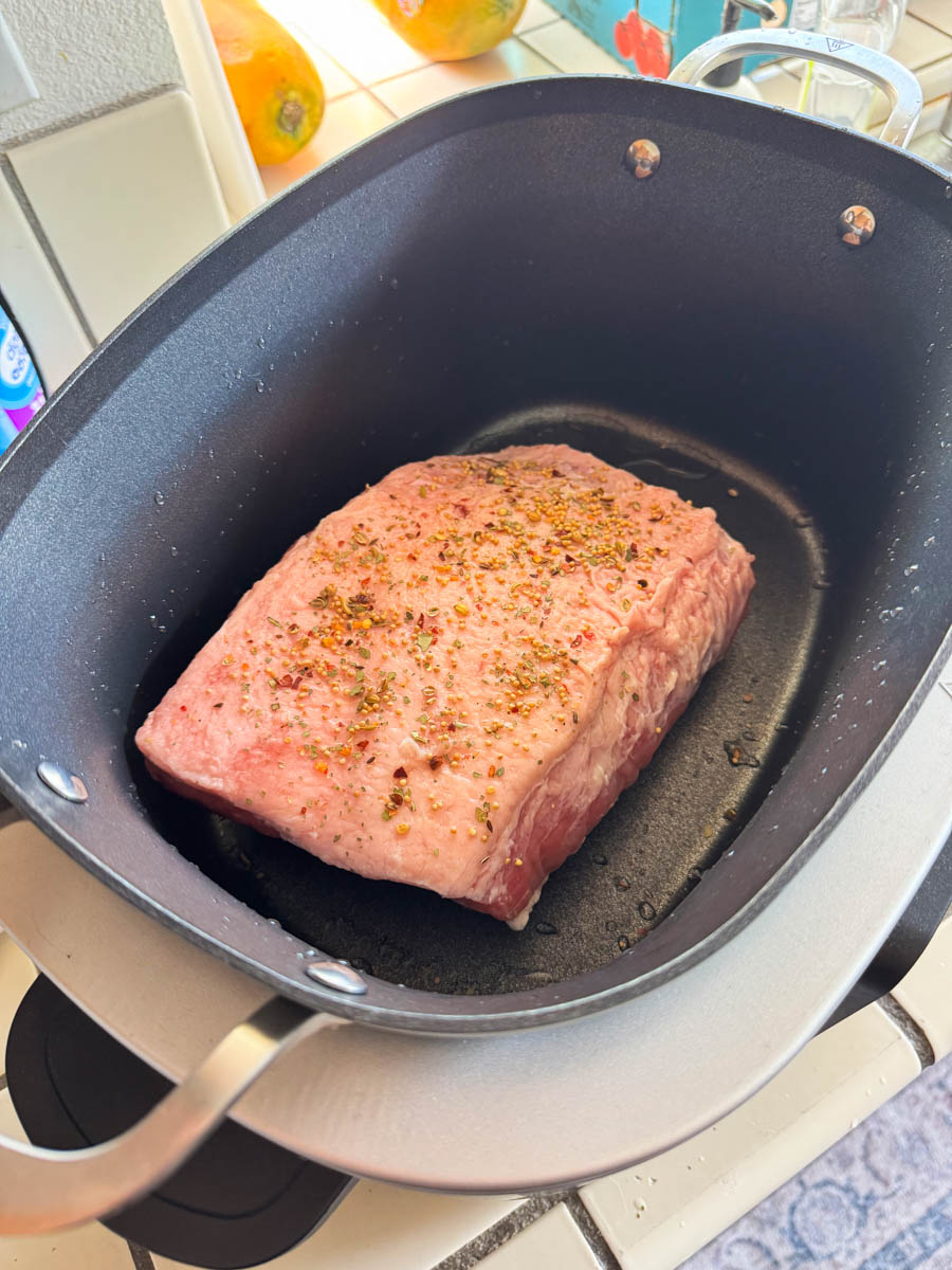 raw corned beef in the pot