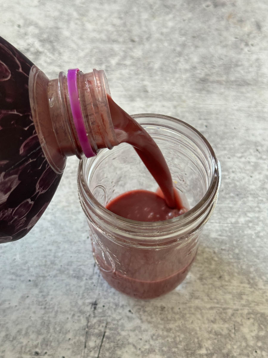 pouring juice into a glass