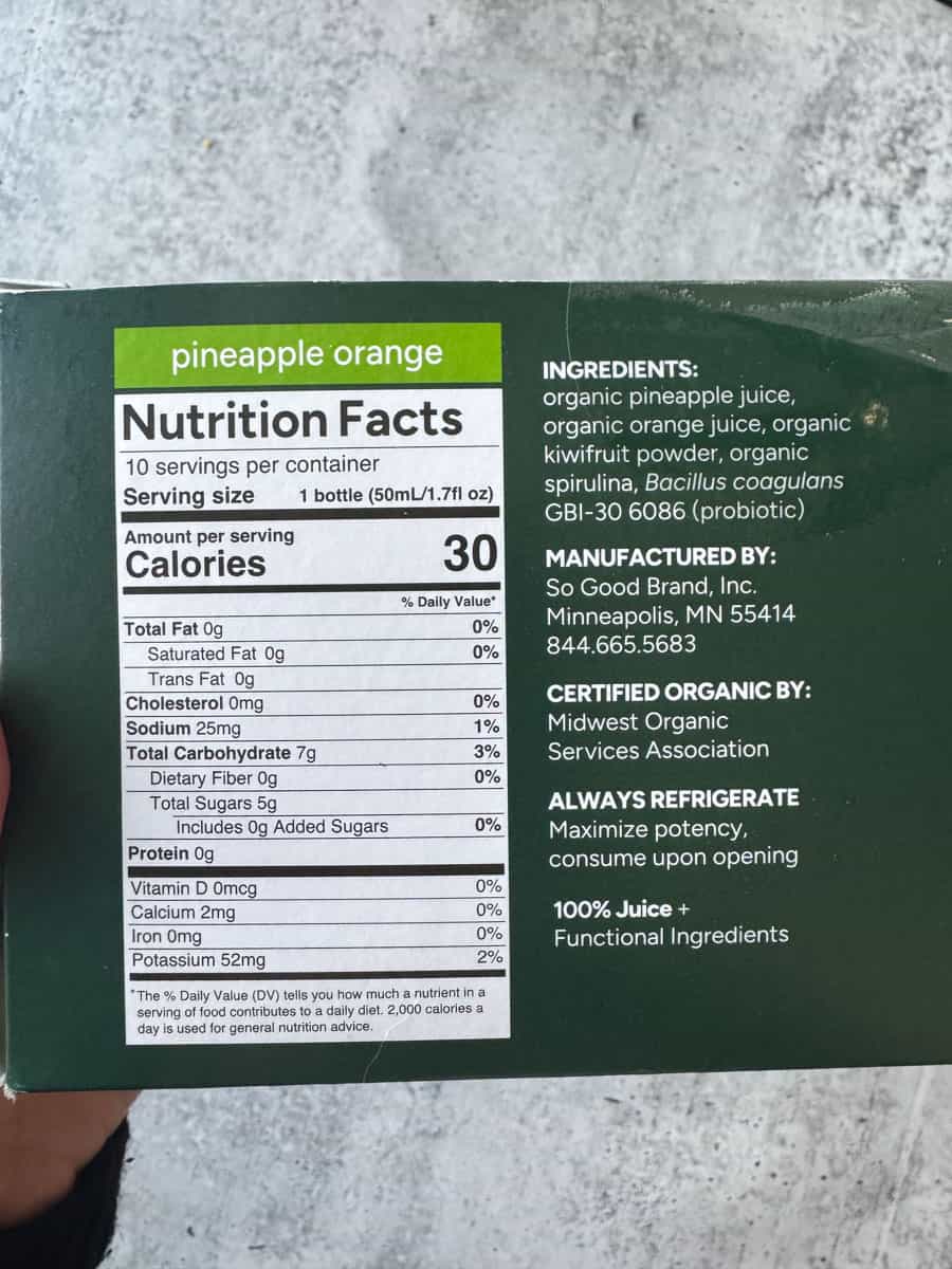 Organic pineapple and orange juice blend for a refreshing drink.