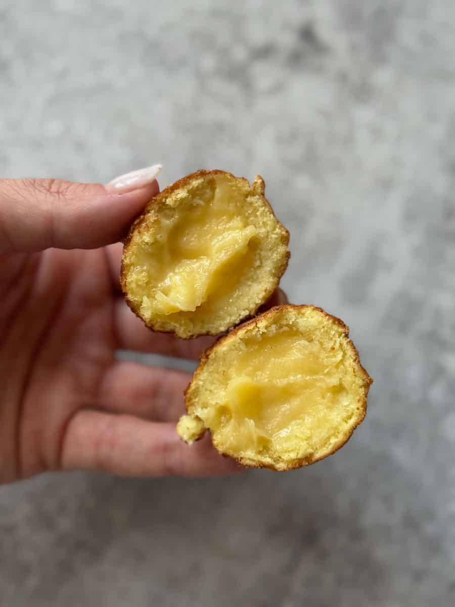 Crispy potato bites filled with melted cheese, perfect for snacks or appetizers.