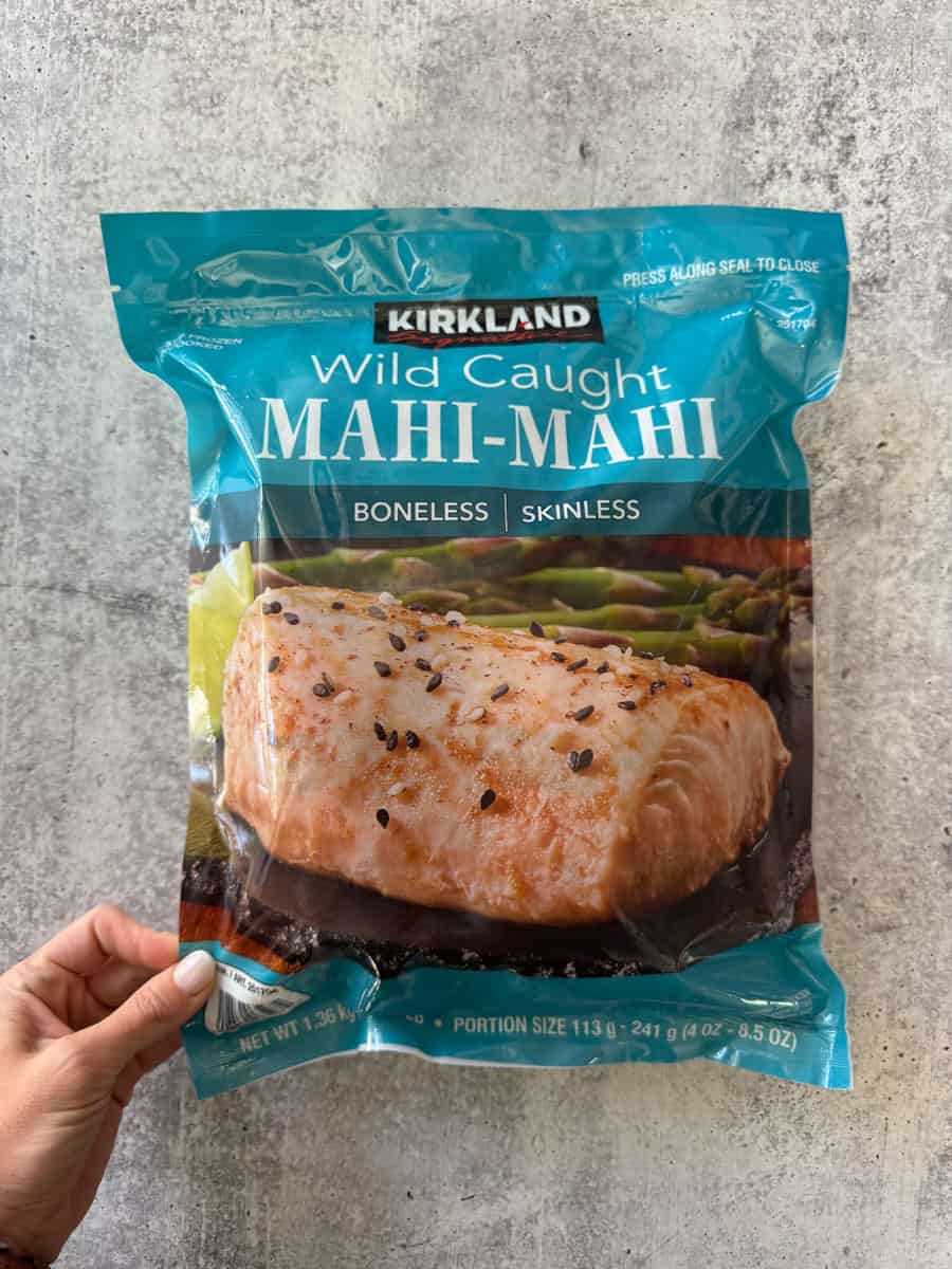 Frozen wild caught mahi-mahi fish in Costco packaging, boneless and skinless.