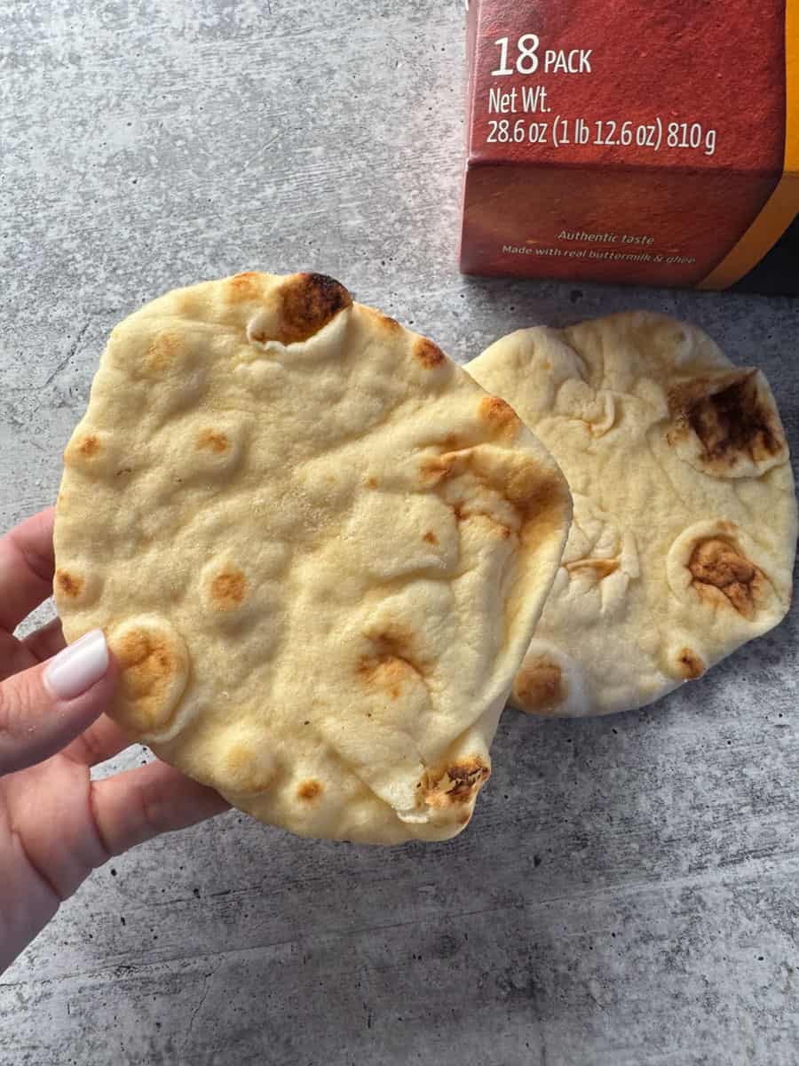 Two pieces of flatbread from Costco with a box in the background.