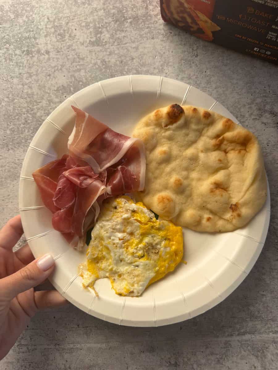 Breakfast plate with prosciutto, naan, and fried egg from Costco.