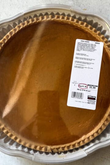 Pumpkin pie in clear plastic container with label from Costco.
