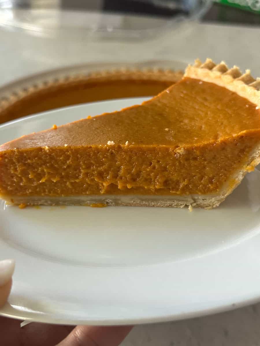Delicious pumpkin pie from Costco with a flaky crust and creamy filling.