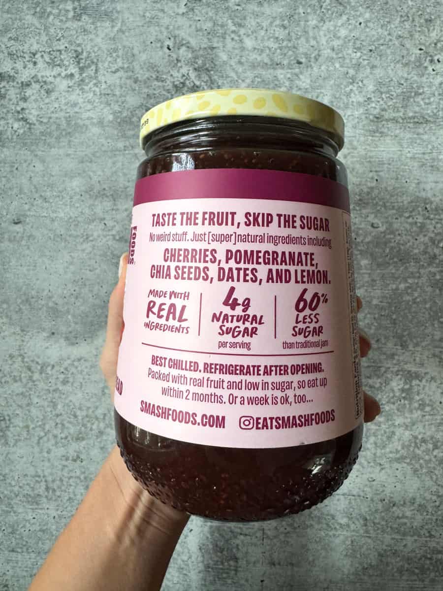 Chia seed jam jar with fruit ingredients and label details.